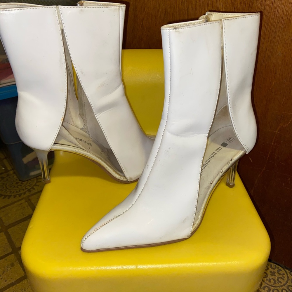 Transparent heeled zip boots